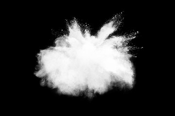 Wall Mural - freeze motion of white color powder exploding on dark background.