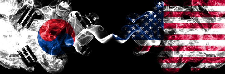Wall Mural - South Korea vs United States of America, American smoky mystic flags placed side by side. Thick colored silky abstract smoke flags of South Korean and United States of America, American