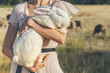 White rebbit in woman hands, cruelty free,  not tested on animals concept