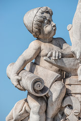 Sculpture of engineer and his scholar on Zoll Bridge in Magdeburg downtown, Germany, sunny day, blue sky