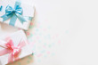 © kostikovanata - A gift for a boy and a girl at the same time. Surprise. Satin ribbon in blue and pink.