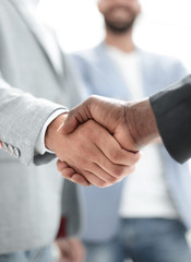 Fototapete - Business handshake. Two businessman shaking hands in office
