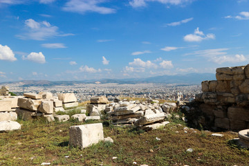 Amazing panoramic view to the athens capital of greece from ruins of ancient acropolis under blue sky with clouds