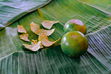 easter eggs and flowers on wooden background