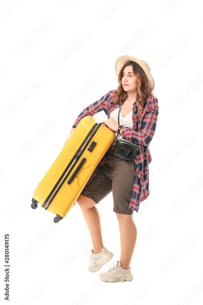 Female tourist with luggage on white background