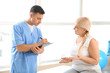 © Pixel-Shot - Physiotherapist working with mature patient in rehabilitation center