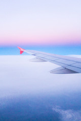 Wall Mural - plane wings and the sky view from the passenger window