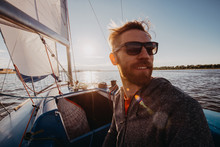 Adult Man On Marina Sport Boat Portrait Happy Relaxed On A Sunset