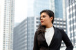 © Atstock Productions - Businesswoman in formal clothing standing outdoors