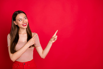 Wall Mural - photo of pretty lady hands indicating empty space wear casual outfit isolated burgundy background