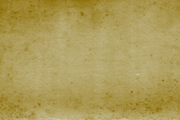 Vintage and old looking paper background. Retro cardboard texture. Grunge paper for drawing. Ancient book page.