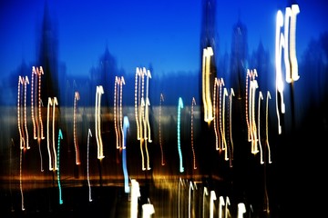 Abstract blurred photo of Moscow city and Moscow Kremlin architecture at night