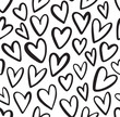 Seamless heart pattern in doodle style. Hand drawn abstract vector background. Black and white.