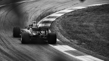 F1 Race Car On The Road, Driving Into The Corner