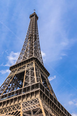 A picturesque view of Famous Eiffel Tower in Paris. Eiffel Tower is tallest structure in Paris and most visited monument in the world. France.