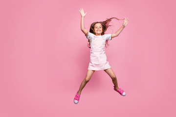 Full body photo of little amazing lady jumping high star shape hands legs wear sun dress shoes isolated pink background