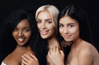 © Tetiana Moish - Beauty portrait of three multiracial women posing in studio. Sensual girls. Studio portrait of a three women looking at camera.