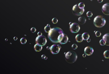 Poster - Realistic soap bubble with rainbow colors on black background. Vector colorful iridescent glass balls or spheres template.