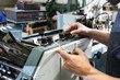 © JacZia - Repair of the printing machine. Machine service, maintenance of the printing machine