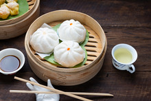 Steamed Dumplings Dim Sum In Bamboo Basket Steamer Chiness Style At Thai Restaurant, Steamed Stuff Bun On Wood Background