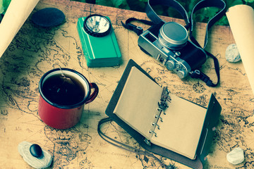 Aufkleber - a map with a travel notebook and travel equipment in a retro style. Journey plan