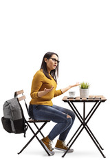 Poster - Young woman sitting on a chair and arguing