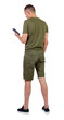 © ghoststone - Back view of man in shorts who is looking into the smartphone.