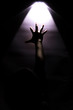 © Benjamin - hand reaching up to touch a glowing light