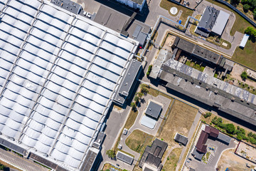 Wall Mural - roof of industrial distribution warehouse from above. drone photography