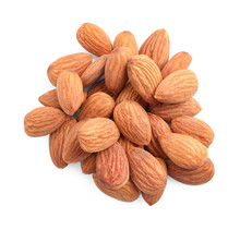 Organic Dried Apricot Kernels On White Background, Top View