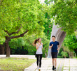 © Tom Wang - happy young Couple jogging and running  in park