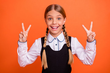 Poster - Close-up portrait of her she nice attractive lovely charming cute cheerful cheery glad pre-teen girl showing double v-sign good mood isolated over bright vivid shine orange background