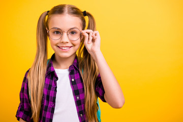 Sticker - Closeup photo of little lady return school eager get knowledge wear specs new bag checkered shirt isolated yellow background