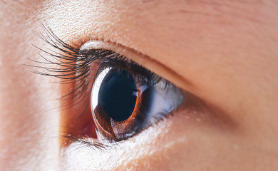 Close-up and selected focusing on a beautiful asian little girl eye .