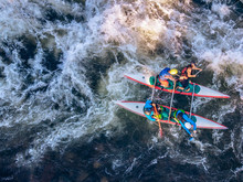 Guy In Kayak Sails Mountain River. Whitewater Kayaking, Extreme Sport Rafting. Aerial Top View