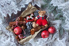 Christmas Card, A Box Of Apples, Cookies, Cinnamon, Nuts, A Toy Bear And Horse, Fir Branches And A White Woolly Lace Scarf.