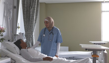 Female Patient Interacting With Female Patient In The Ward