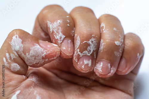 Fotomural Woman's hand be stained with white acrylic glazing putty on white background,Clo