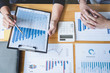 © Ngampol - Professional executive Business colleague team working and analyzing with new project of accounting finance, Idea presentation and meeting strategy plan of financial business investment