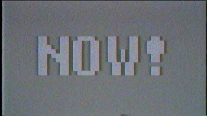 Poster - Grey dirty noise on black glitch video damage background. Noise and grain bad signal broken tv monitor. With the words on the screen NOW.