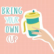 Reusable cup for drinks in female hands in zero waste life style.