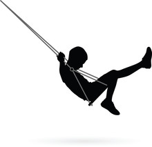 Boy Swinging On A Swing