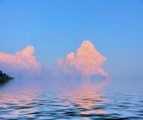 Wall Mural - Colorful beautiful lake landscape. blue sky pink Cumulus clouds