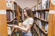 © Freepik - Back to school concept with woman studying in library