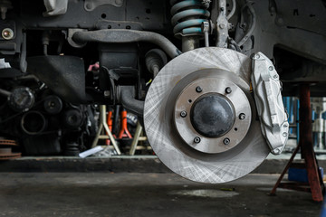 Wall Mural - New car brake system replacement, brake disc, brake caliper.