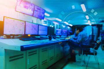 Double exposure Blurred light of man Engineering operations checking production process, Control room of a steam Turbine, Generators in the coal-fired power plant. Technology and industry concept