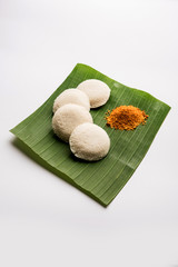 Poster - Podi idli is a quick and easy snack made with leftover idly. served with sambar and coconut chutney. selective focus