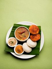 Wall Mural - Podi idli is a quick and easy snack made with leftover idly. served with sambar and coconut chutney. selective focus