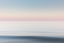 A Soft Blue And Pink Blurred Seascape
