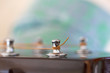 © David Smart/Stocksy - Guitar string in a tuning peg.
